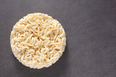 High angle view of pasta on white table