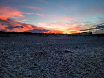 Scenic view of landscape against sky during sunset