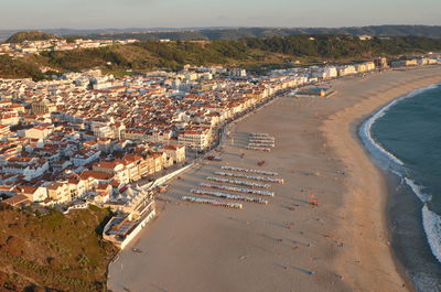 High angle view of townscape by sea