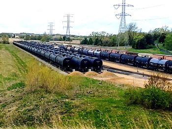 Train on field against sky