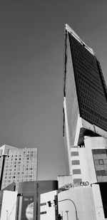 Low angle view of buildings against clear sky