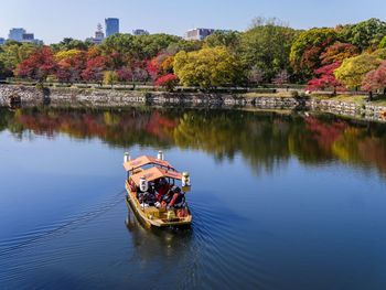 Scenic view of lake by autumn trees