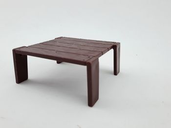 High angle view of toy on table against white background