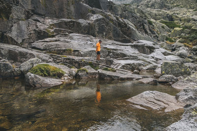 A young man explores the outdoors in sierra de gredos, avila, spain