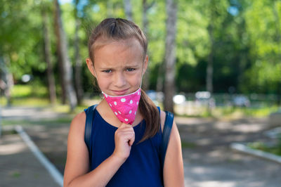 Portrait of girl holding ice cream