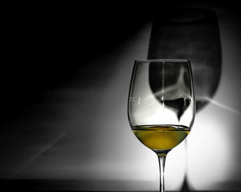 Close-up of wine in glass on table