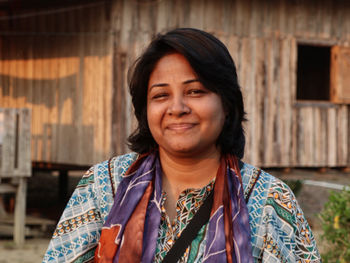 Portrait of a smiling woman in morning sunlight