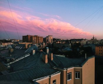 View of town against sky during sunset