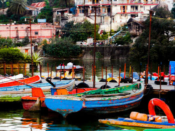 Boats moored at harbor