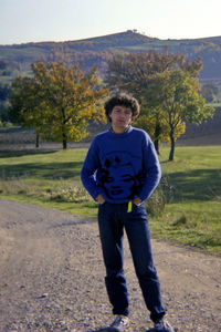 Portrait of smiling boy standing on land