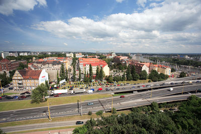 Aerial view of cityscape against sky