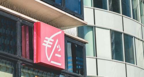 Low angle view of sign on building