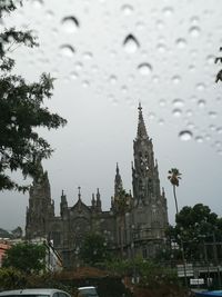 View of cathedral in city against sky