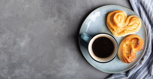 Directly above shot of cappuccino served on table