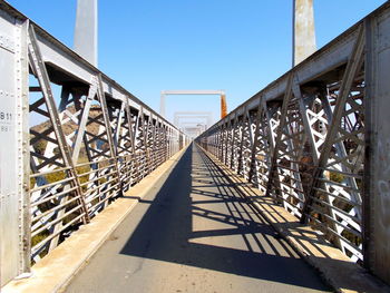 Surface level of footbridge along railings