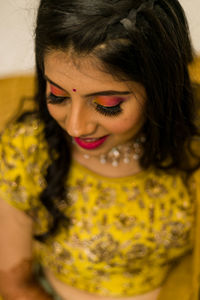 Close-up portrait of a smiling young woman