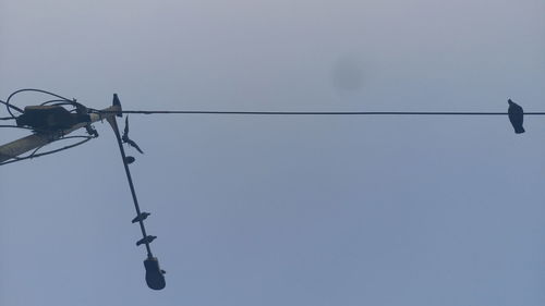 Low angle view of power lines