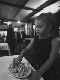 Man looking at restaurant