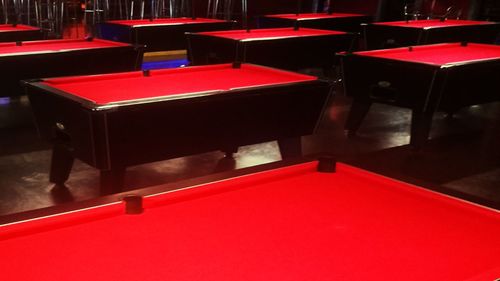 Empty chairs and tables in restaurant