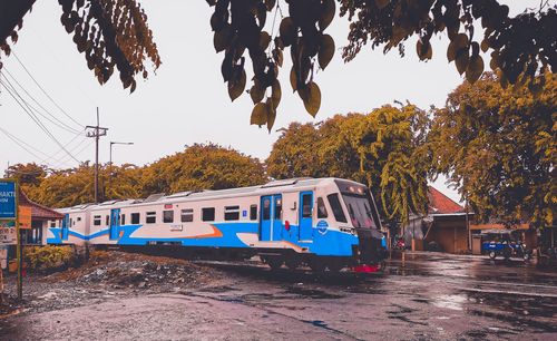 Train on railroad track against sky