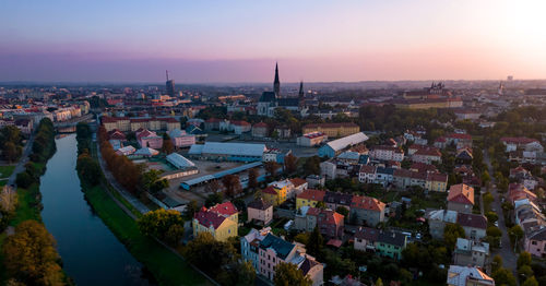 High angle shot of townscape against sky at sunset