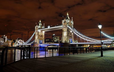 Illuminated suspension bridge at night