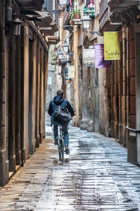 Rear view of man walking outdoors