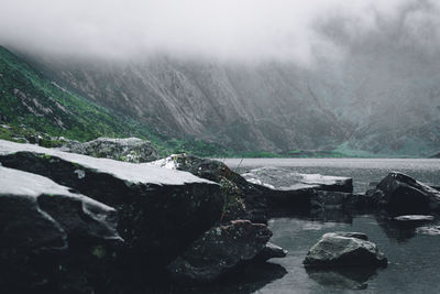 Scenic view of rocks in mountains during winter