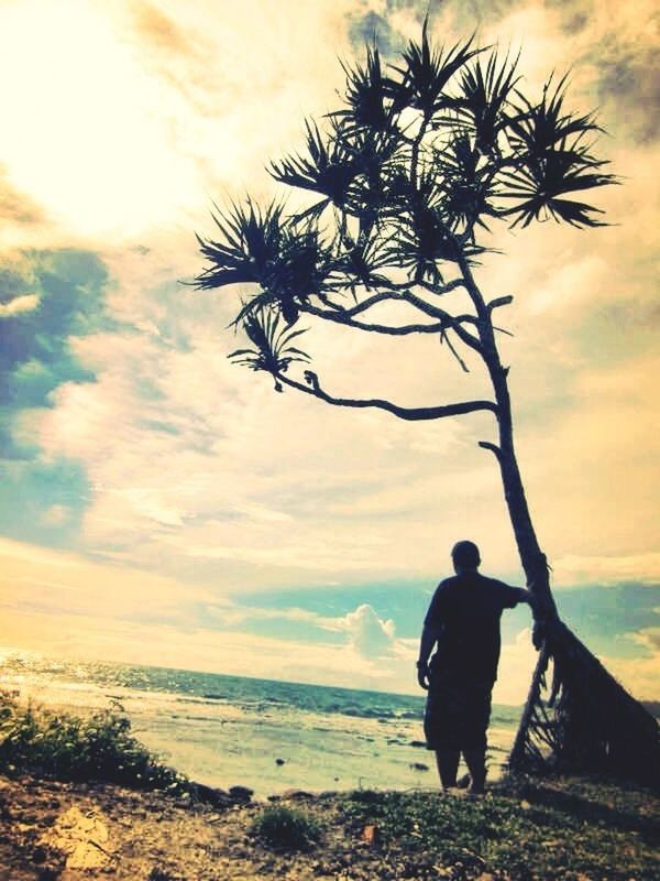 sky, lifestyles, leisure activity, sea, sunset, men, full length, silhouette, beauty in nature, water, beach, tranquil scene, rear view, horizon over water, nature, scenics, standing, tranquility