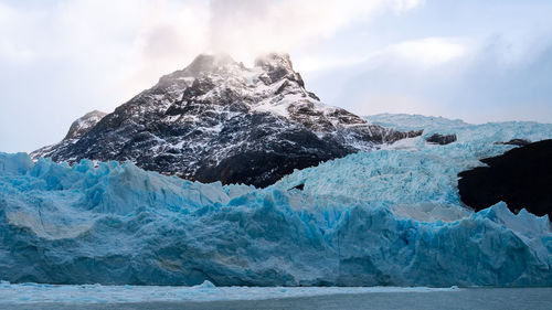 Scenic view of frozen sea against sky