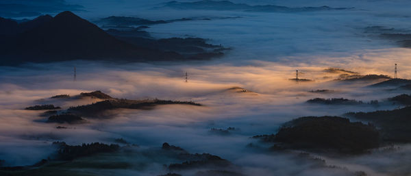 Scenic view of mountains against sky during sunset