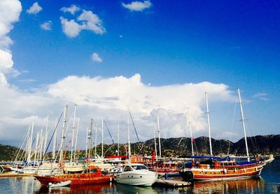 Boats moored at harbor