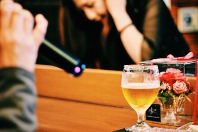 Close-up of beer glass on table