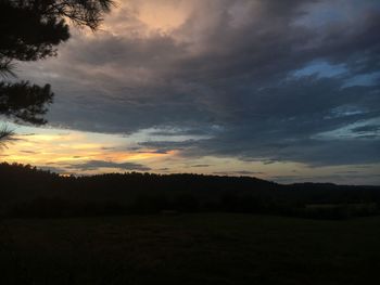 Scenic view of silhouette landscape against sky during sunset