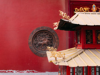 Low angle view of statue against building