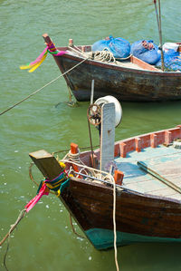 High angle view of fishing boat moored in lake