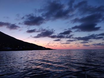 Scenic view of sea against sky at sunset