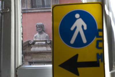 Close-up of arrow sign