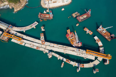 High angle view of sailboats moored in sea