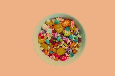 Directly above shot of multi colored candies on table