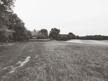 Scenic view of field against clear sky
