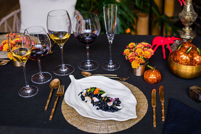 High angle view of wineglasses on table