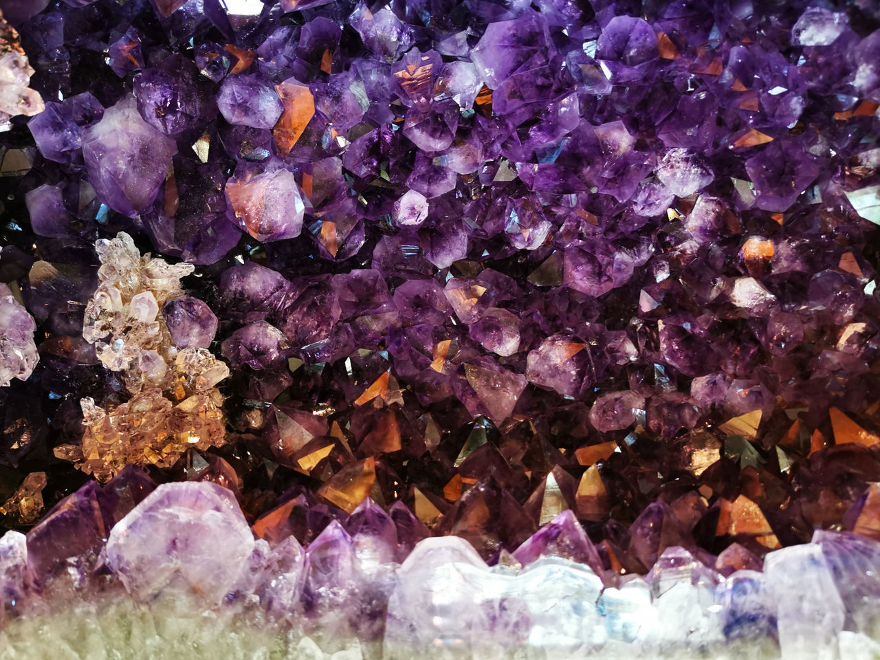 purple, flower, full frame, no people, backgrounds, nature, amethyst, gemstone, close-up, mineral, multi colored, jewelry, crystal, abundance, coral, outdoors, beauty in nature, rock, day, large group of objects