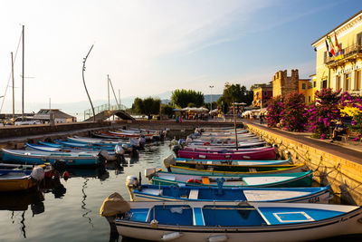 Boats moored at harbor