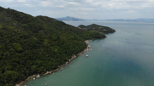 High angle view of bay against sky