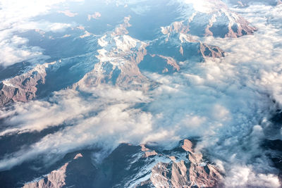 Aerial view of cloudscape over mountains