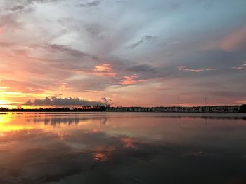 Scenic view of lake against sky during sunset