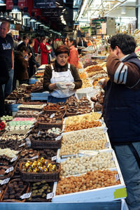 People at market stall