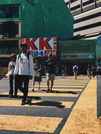 People walking on city street