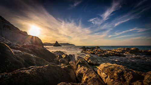 Scenic view of sea against sky during sunset